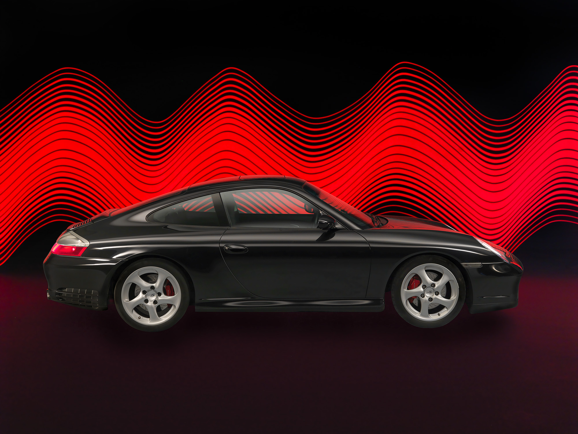 Porsche 911 with Lightpaint in the backgound done in the set!